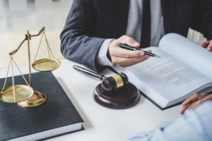 Criminal Defense Attorney reading law book