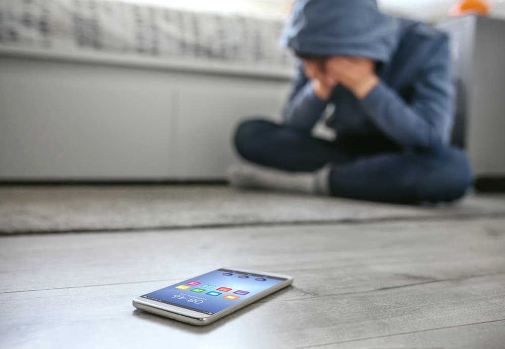 Teenager boy crying desperate for inappropriate material