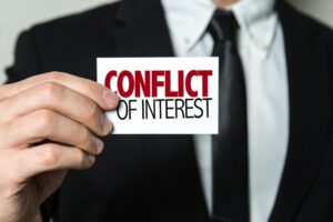 Conflict of Interest Sticker hold by a lawyer